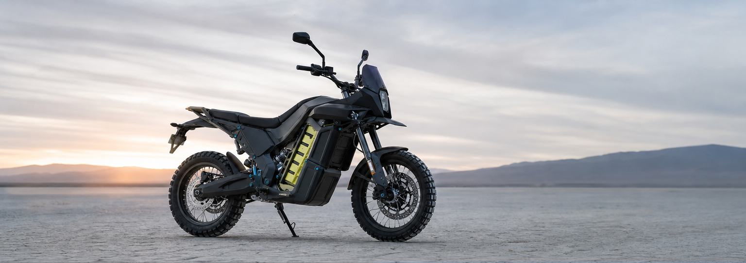 Original fictional electric adventure motorcycle on a pale dry lake at dawn